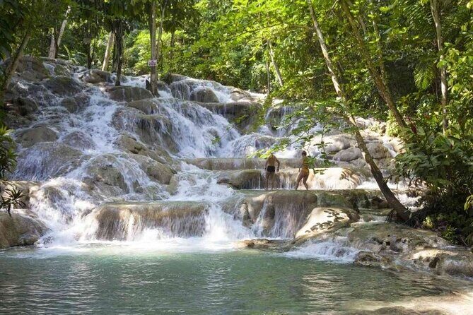 Dunn River falls and green grotto cave fun activities. - The Sum Up