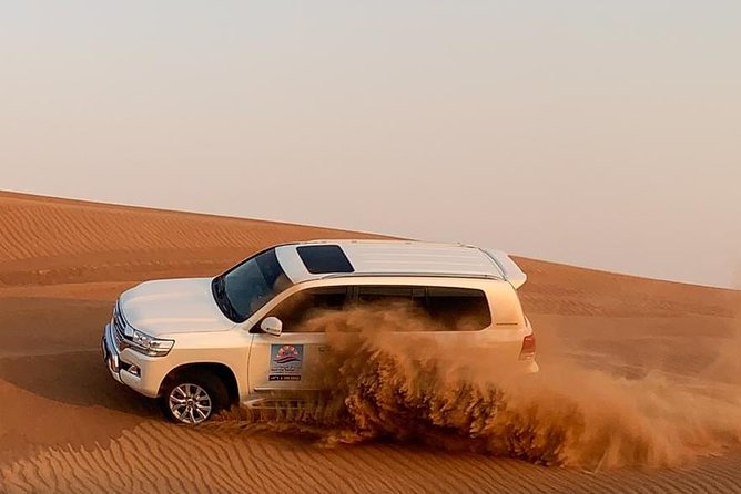 DXB Private Morning Desert Safari With Camel Ride N Sand Boarding - Sandboarding Activity