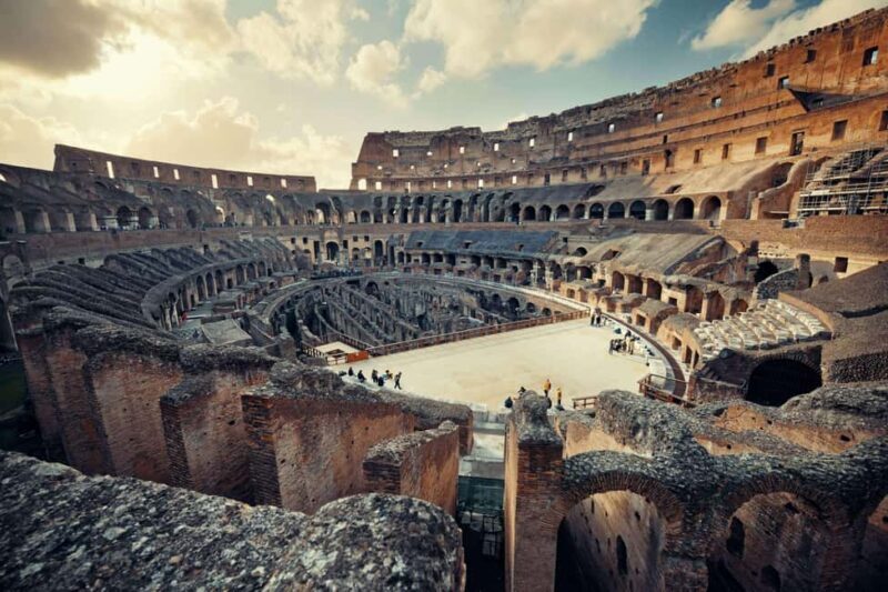 Early Evening Colosseum's Arena, Forum & Trevi Fountain tour - The Experience in Detail
