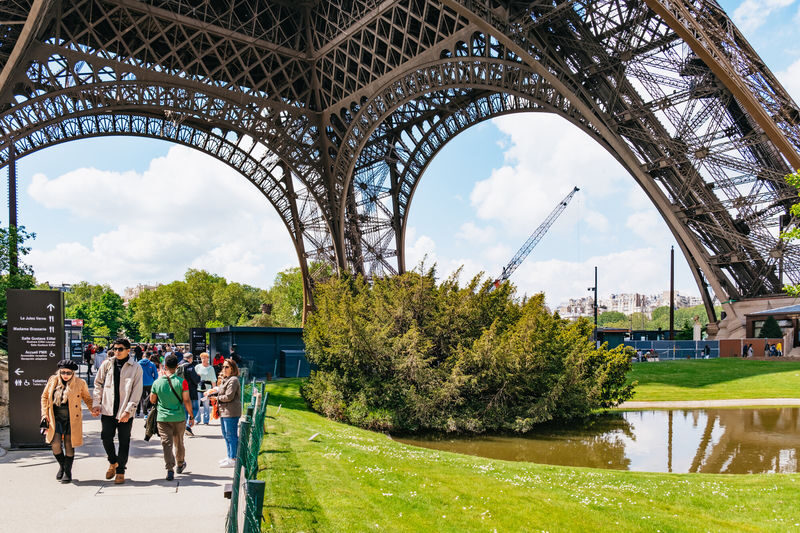 Eiffel Tower Climbing by Stairs with Optional Summit Access - First floor: glass underfoot and a useful pause