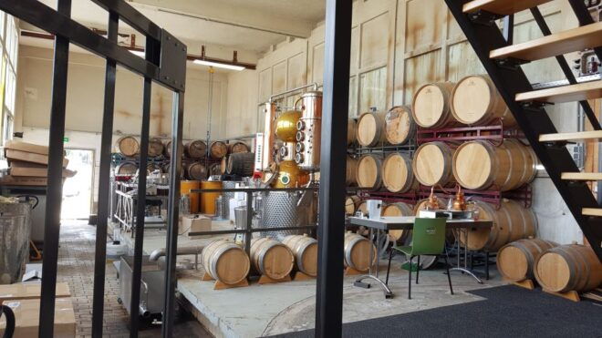 Eindhoven: Bottle Distillery Tour and Tasting Experience - The Copper Helmet and Small Batch Production