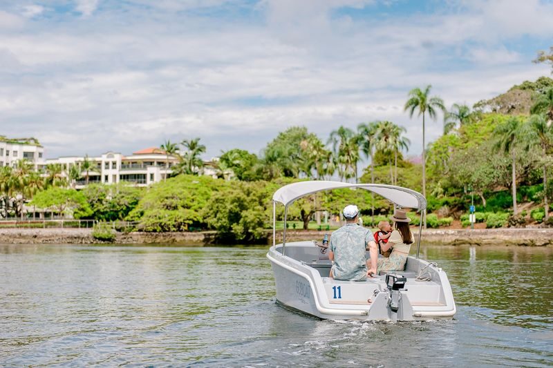 Electric Picnic Boat Rental in Brisbane - Taking the helm from Newstead
