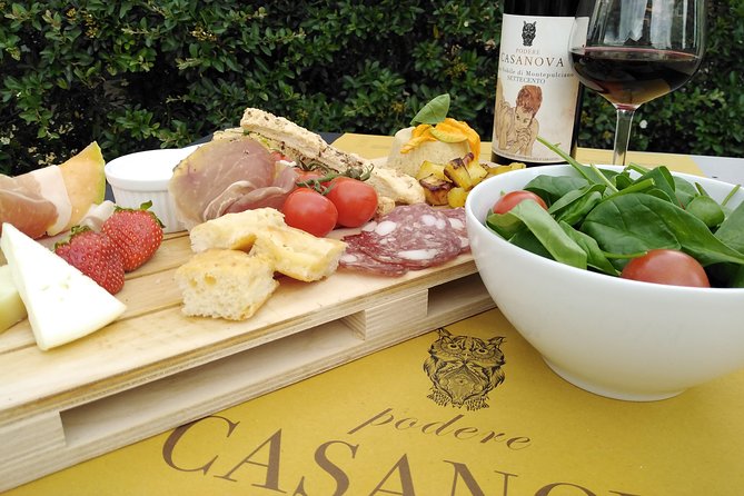 Enjoy a Meal With Wine Tasting in the Vineyard of Podere Casanova - Vineyard Setting and Atmosphere
