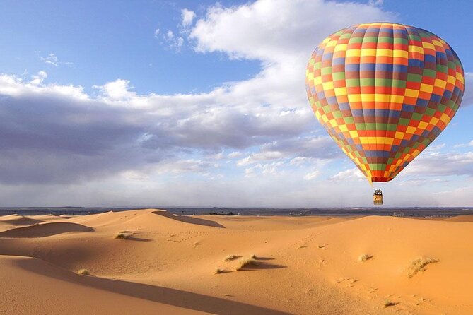 Enjoy Dubai Beautiful Desert By Hot Air Balloon With Falcon Show and Camel - Balloon Ride Experience
