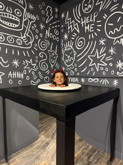 Entrance to the Bilbao Illusions Museum - The Sum Up