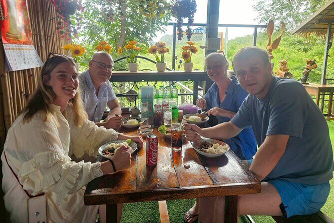 Erawan Waterfall and Kanchanaburi Multilingual Private Tour - First Stop: The Enchanting Erawan Waterfalls