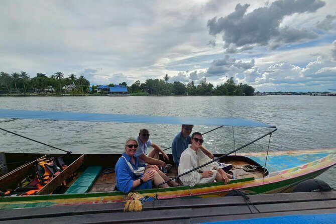Erawan Waterfall and Kanchanaburi Multilingual Private Tour - Scenic Long-Tailed Boat Ride on the River Kwai