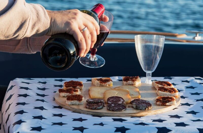Es Castell: Private Boat Tour With Aperitif and Sunset. - Key Points