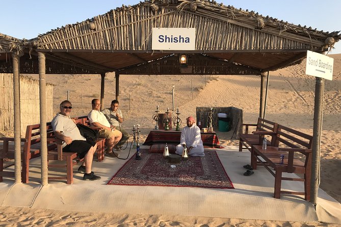 Evening Desert Safari 4x4 Dune Bashing,Sandboarding,Camel Riding,Dinner - Immerse Yourself in the Beauty of the Desert