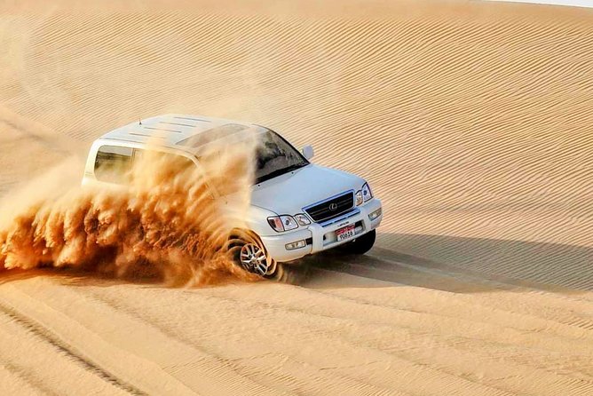 Evening Desert Safari 4x4 Dune Bashing,Sandboarding,Camel Riding,Dinner - Create Unforgettable Memories in the Arabian Desert