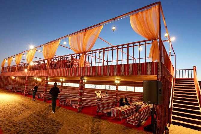 Evening Desert Safari Dubai With Buffet, Dune Bashing, Camel Riding, and Tanura - The Sum Up