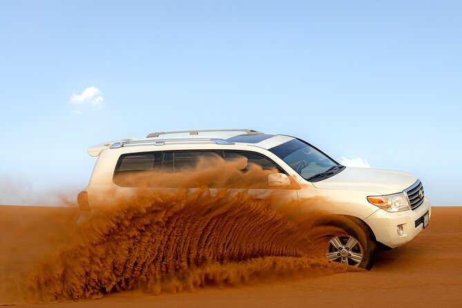 Evening Desert Safari in Dubai, Sandboard & BBQ Dinner - Pricing and Guarantee