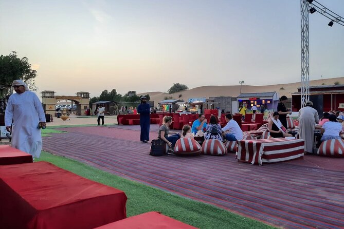 Evening Desert Safari With BBQ Dinner, Sandboarding and Camel Ride Experience - What to Expect: BBQ Dinner, Sandboarding, and Camel Ride