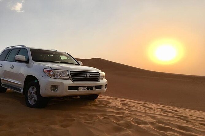 Evening Desert Safari With Dune Bashing, Camel Ride, Dinner - Dubai - The Sum Up