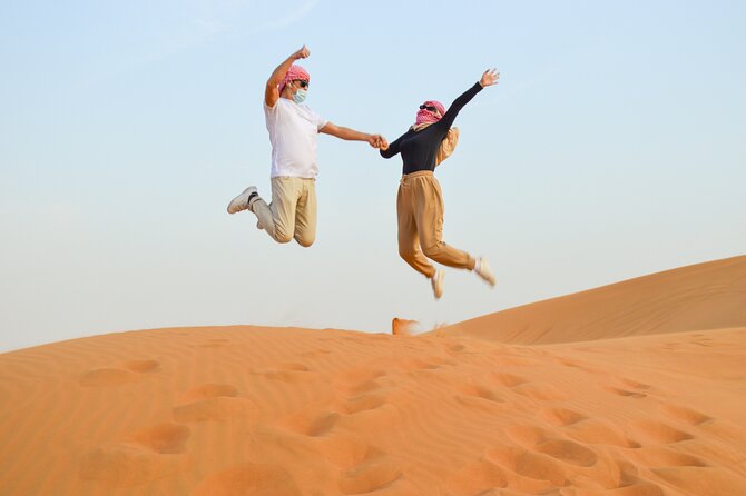 Evening Desert Safari With Quad Bike, BBQ Dinner and Camel Ride - Expert Guided Sand Dune Exploration