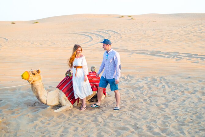 Evening Desert Safari With Quad Bike, BBQ Dinner and Camel Ride - Scenic Camel Ride Experience