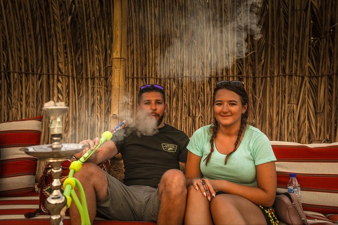 Evening Red Dunes Desert Safari Dubai With Sanboarding Camel Ride & BBQ - The Sum Up