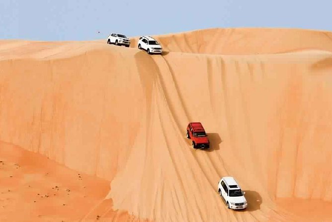 Exciting Dubai Dune Buggy Safari & Sand Boarding & BBQ Dinner & Belly Dance Show - Sandboarding and Camel Riding