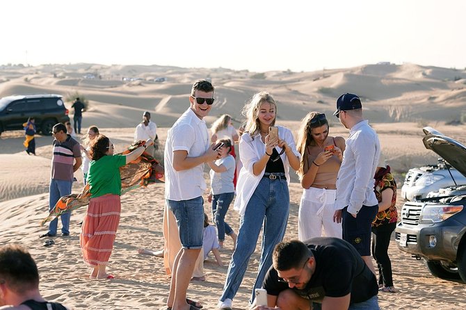 Exclusive Sunrise Desert Safari With Camel Ride Sand Boarding Dune Bashing - Serene Visit to a Camel Farm