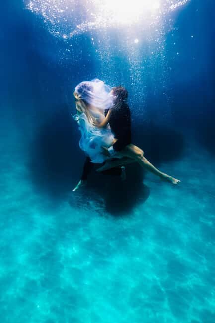 Exclusive underwater photo shoot in the sea near Palmain a turquoise blue bay - The Beauty of the Location: Santa Ponça’s Turquoise Bay
