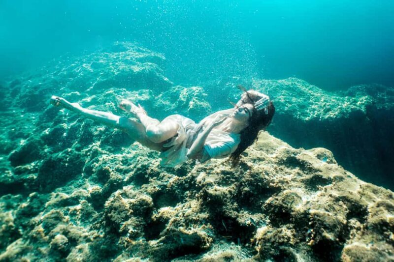 Exclusive underwater photo shoot in the sea near Palmain a turquoise blue bay - Optional Extras: Costumes and Freediving