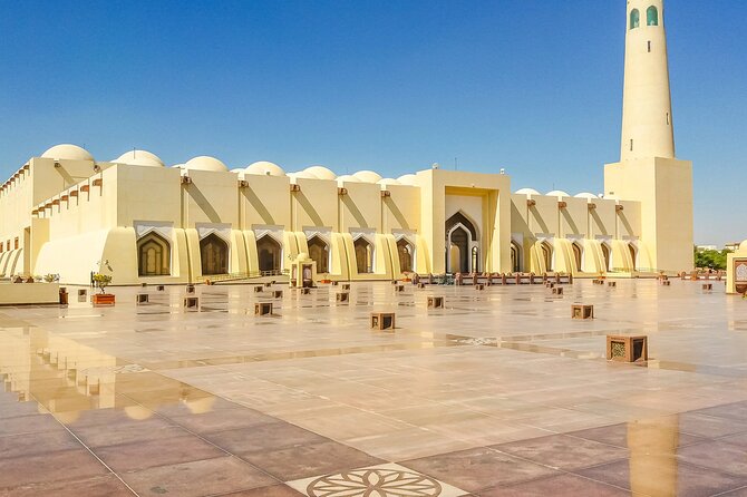 Experience Doha City Tour With Local Guide and Dhow Ride - Exploring Dohas Iconic Landmarks