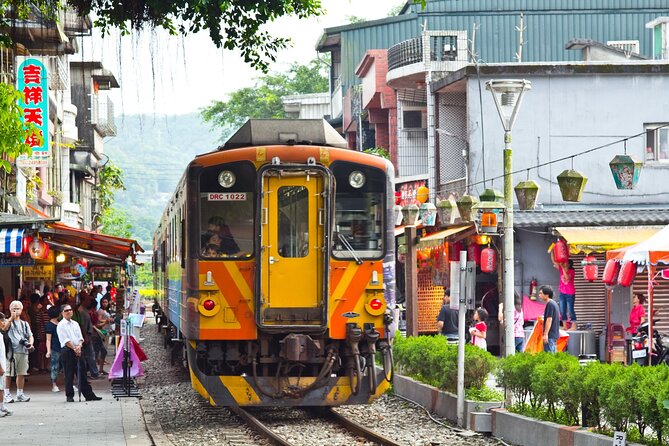 Experience Pingxi Sky Lantern and Shifen Waterfall From Taipei - Exploring the Charming Shifen Old Street