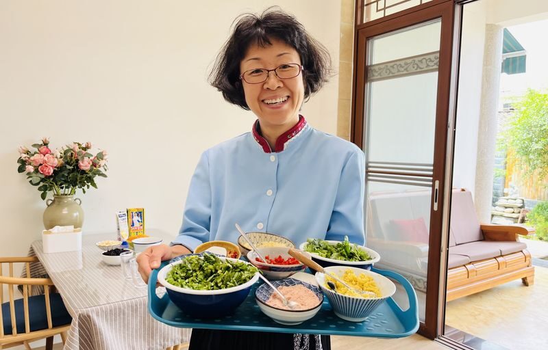 Explore a local ethnic market and prepare Naxi cuisine with a Naxi host. - What to know before you book