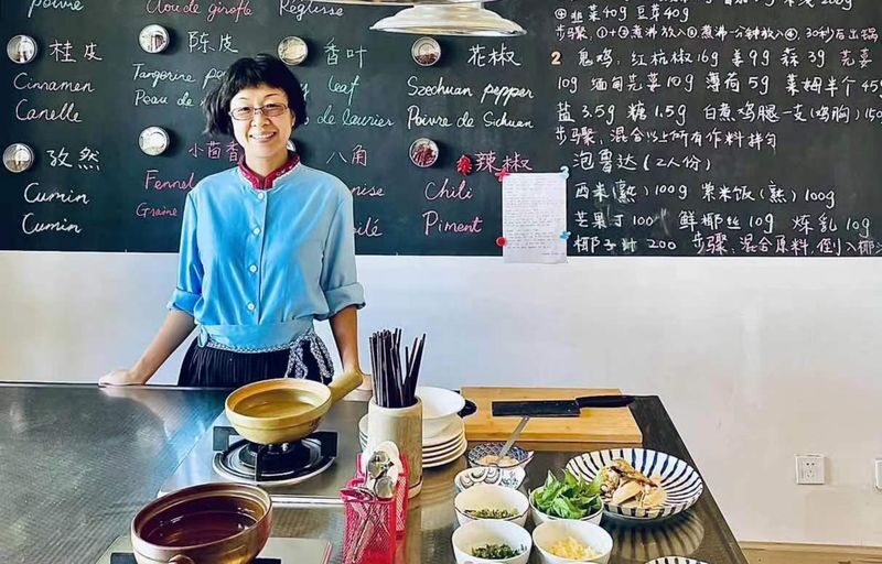 Explore a local ethnic market and prepare Naxi cuisine with a Naxi host. - Start by seeing what Lijiang cooks with