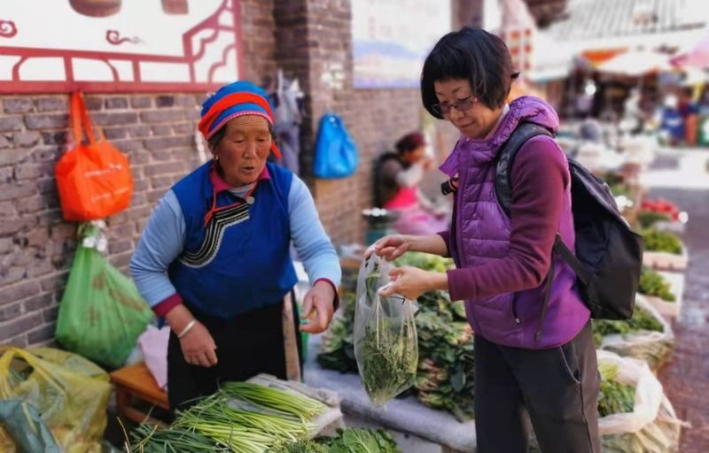 Explore a local ethnic market and prepare Naxi cuisine with a Naxi host. - How much time to set aside