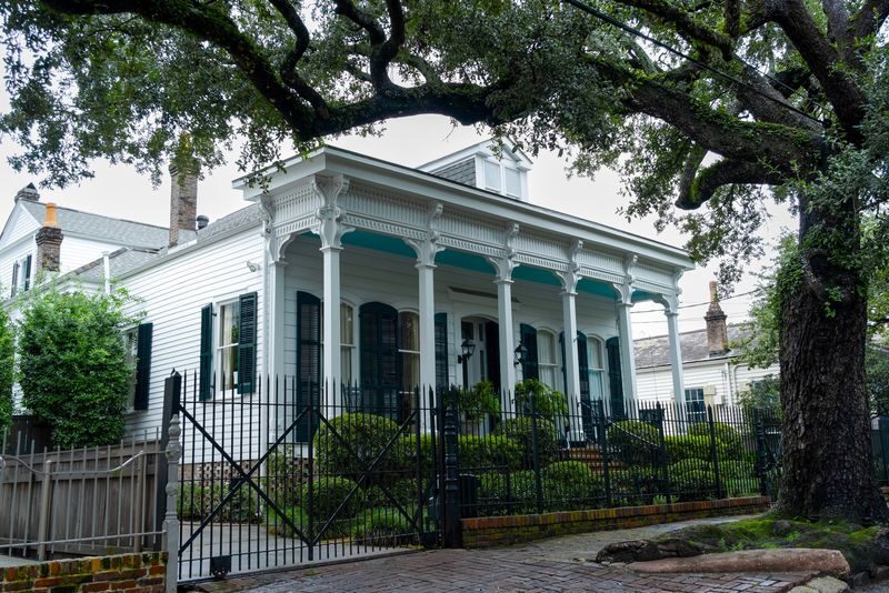 Explore Historic New Orleans Hidden Garden District Tour - Mansions, cottages, and the stories between them