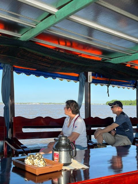 Explore the Enchanting Mekong Delta: Full-Day Adventure - Journey by Van and Ferry