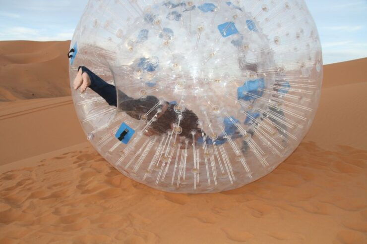 Extreme Adventure With Harness Zorbing in Merzouga Dunes - Experience Highlights