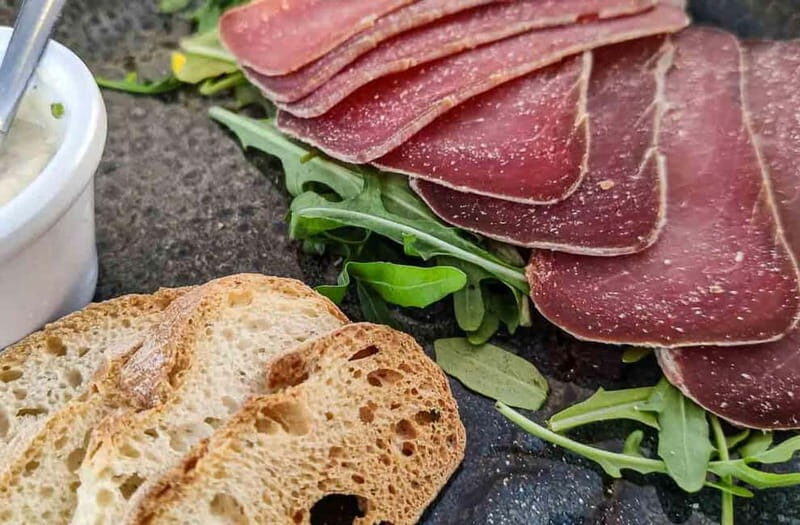 Faro food tour (with drinks) & city highlights - 10 tastings - Tasting Stops: Traditional Portuguese Flavors