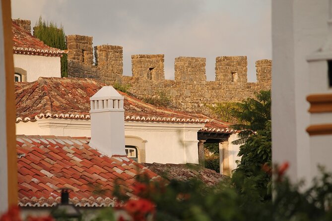 Fátima and Óbidos Full Day Tour From Lisbon With Pick up - Nazaré Fishing Village and Surfing