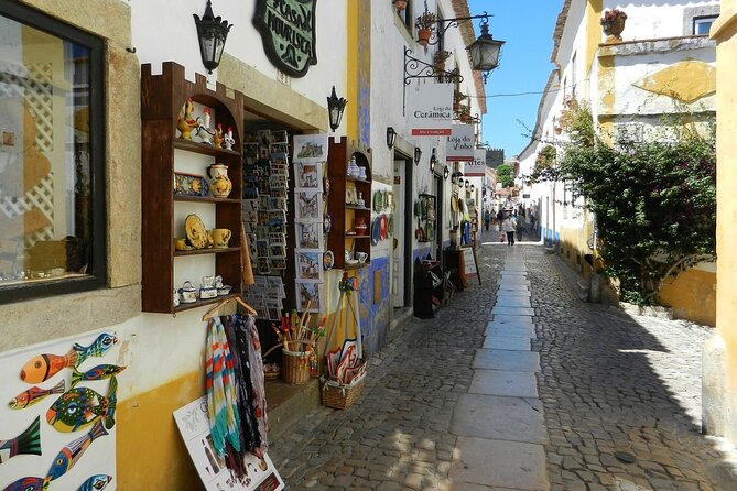 Fátima and Óbidos Full Day Tour From Lisbon With Pick up - Religious Souvenirs and Ginginha Tasting