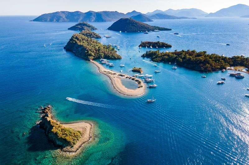 Fethiye 12 Islands Full-Day Guided Boat Tour - Cavy Bay and Red Island round out the route