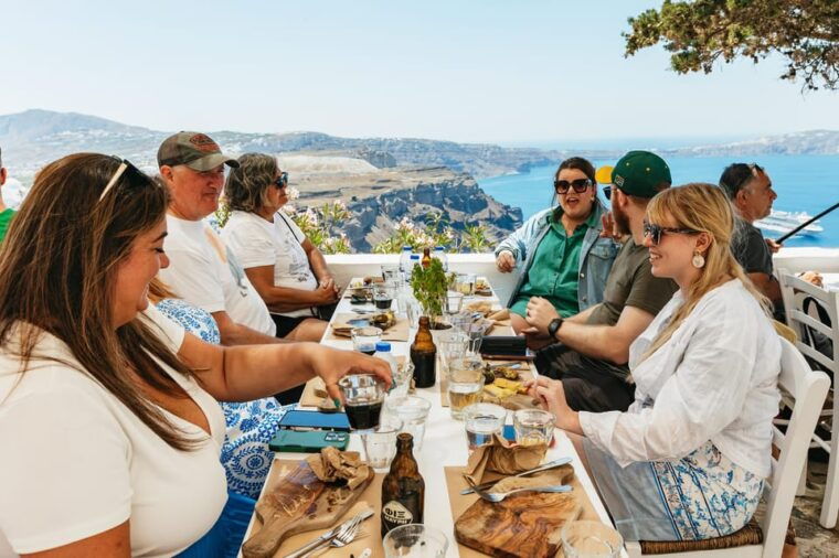 Fira: Guided Foodie Walking Tour with Tastings - The Guides: Knowledge, Humor, and Local Tips