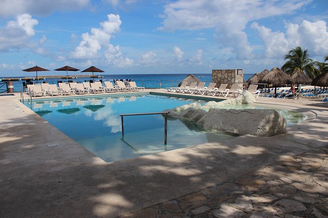 Fish Spa and Beach Break, Swimming Pool, Lounge Chairs, Umbrellas, Beach Area - Pricing and Information