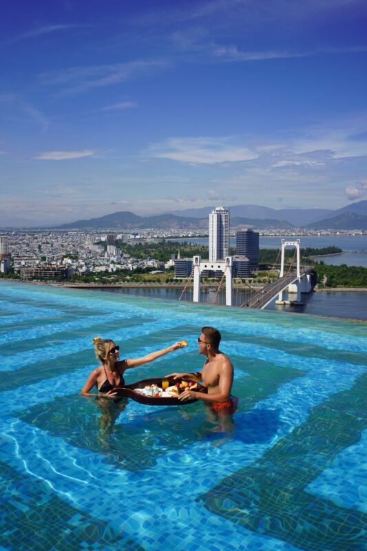 Floating Breakfast On Infinity Pool At Wyndham Danang Golden Bay - The shared-pool trade-off