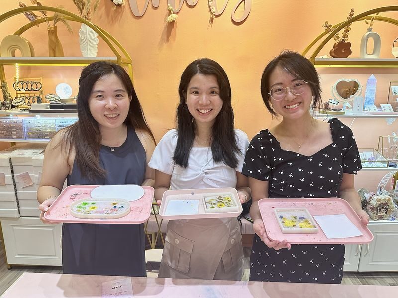 Floral Resin Coaster Workshop by Floral Knots at Orchard Gateway - The Orchid option adds a Singapore note
