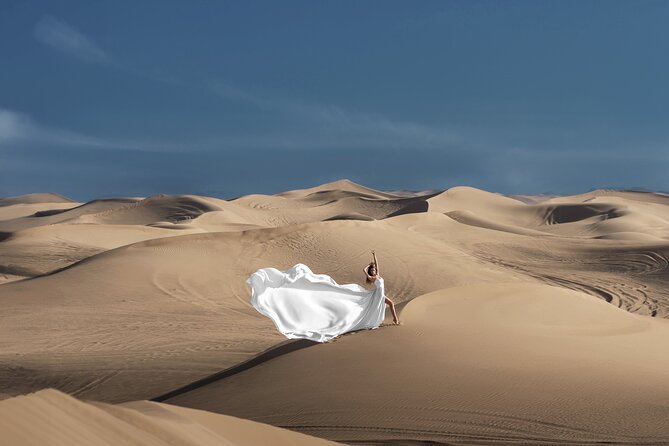 Flying Dress © Photoshoot in Dubais Red Sand Desert - Reservation and Cancellation