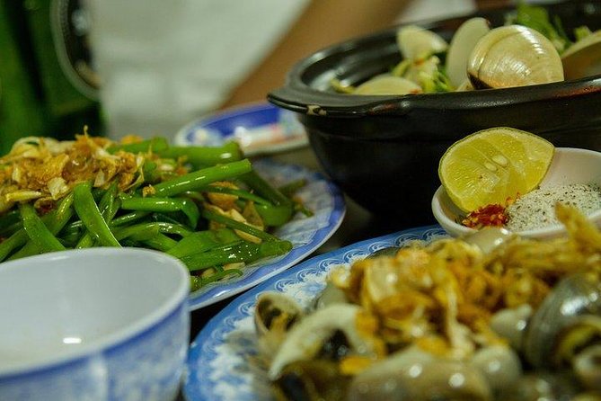 FOOD TASTING EXPERIENCE IN HO CHI MINH CITY by MOTORBIKE - Cultural Immersion Activities