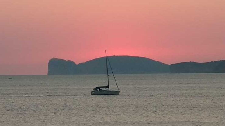 From Alghero: Sunset on a Sailing Boat With Aperitif - Itinerary Highlights