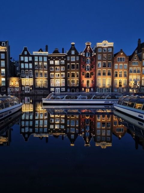 From Amsterdam: Private Tour to Paris via Brussels - Experience the Rieker Windmill in Amsterdam