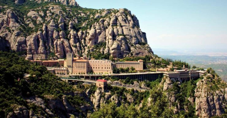 From Barcelona: Half-Day Trip to Montserrat Mountain - Pricing and Cancellation