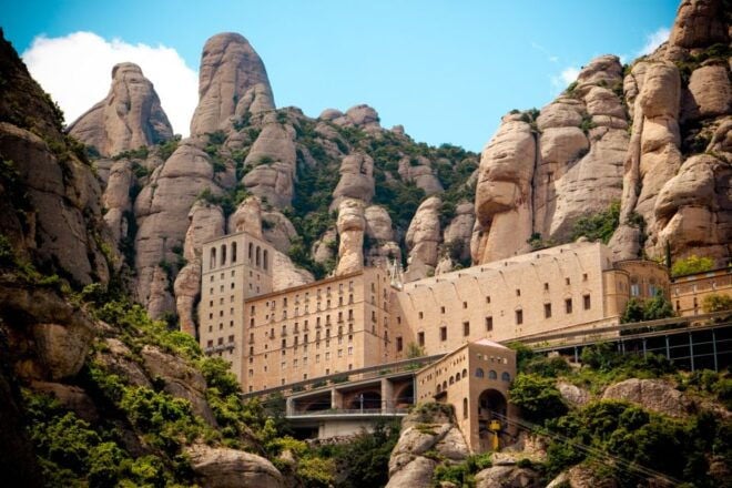 From Barcelona: Montserrat Guided Tour & Return Bus Transfer - Explore the Monastery