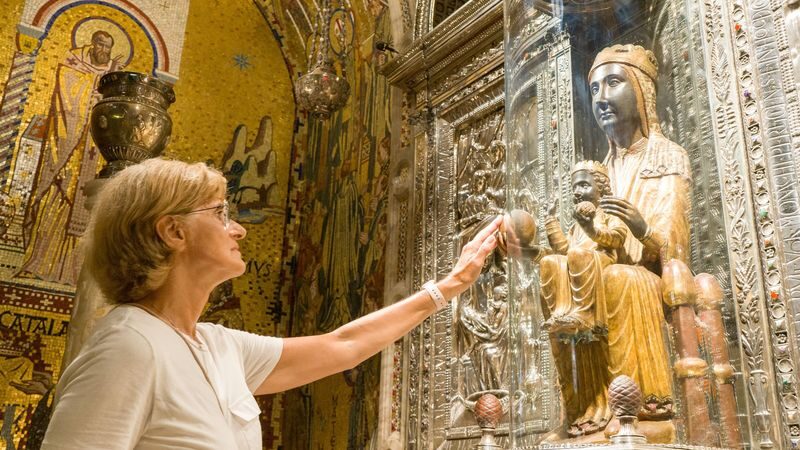 From Barcelona: Montserrat Half-Day Tour - Mountain, Monastery & Views - Inside the monastery: the Black Madonna