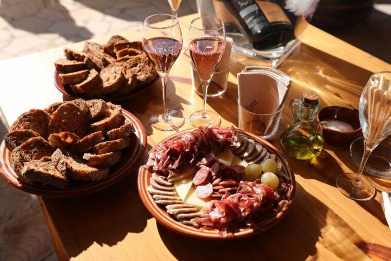 From Barcelona: Montserrat Lunch & Wine Tasting in Vineyard - Pickup and Travel