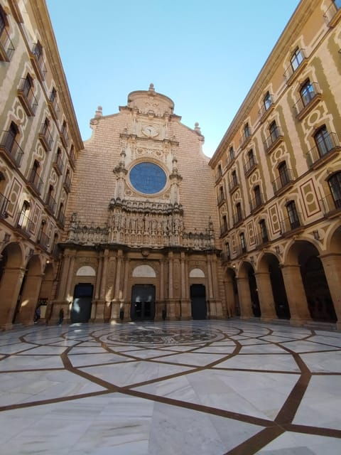 From Barcelona: Montserrat Monastery & Hike With Cable Car - Farmers Market Visit and Local Delicacies